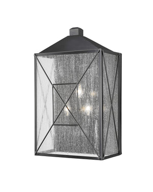 Wall Sconces Caswell Outdoor Wall Sconce - Powder Coated Black - Clear Seeded Glass - 8in. Extension - E26 Candelabra Base