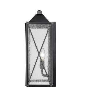 Wall Sconces Caswell Outdoor Wall Sconce - Powder Coated Black - Clear Seeded Glass - 7in. Extension - E26 Candelabra Base