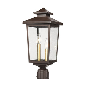 Post Top Lamps Eldrick Outdoor Post Top Lantern - Powder Coat Bronze - Clear Seeded Glass - 11.1in. Diameter - E12 Candelabra Base